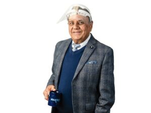 A man wearing a face shield